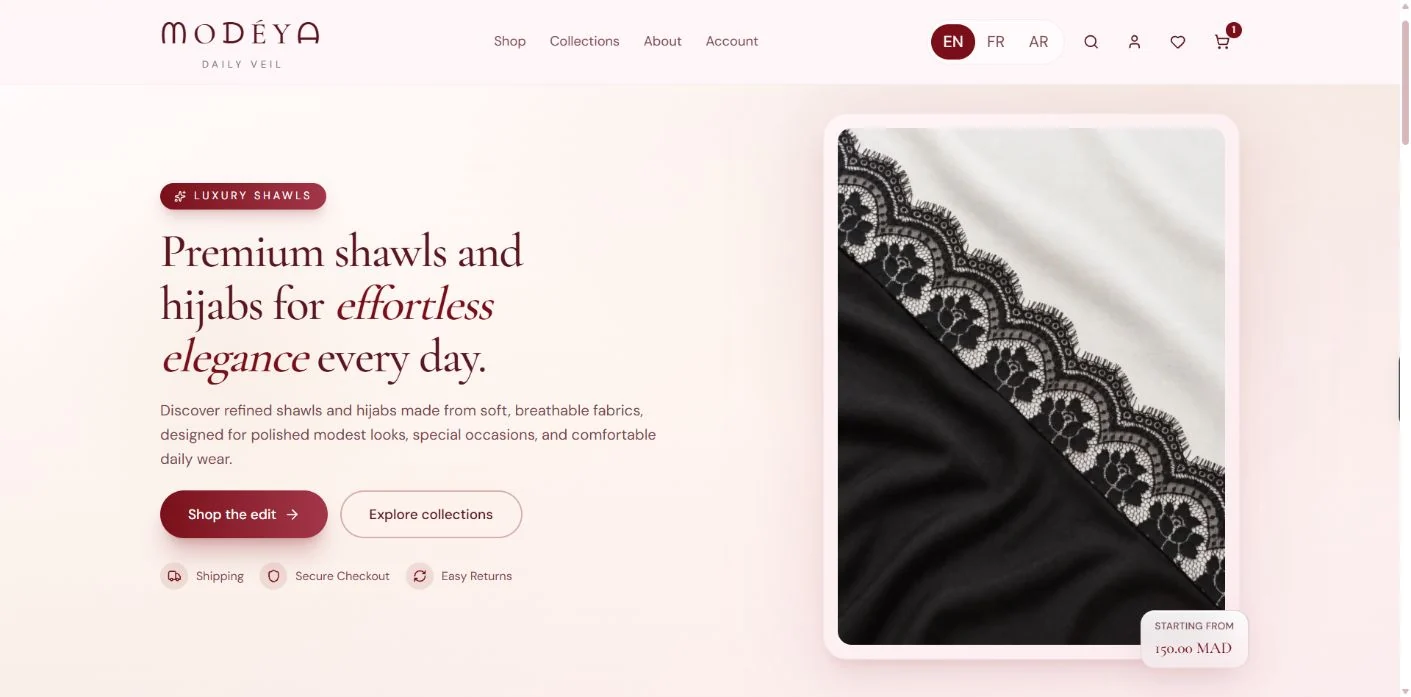 The actual MODEYA scarf storefront homepage, showing its product collection and navigation